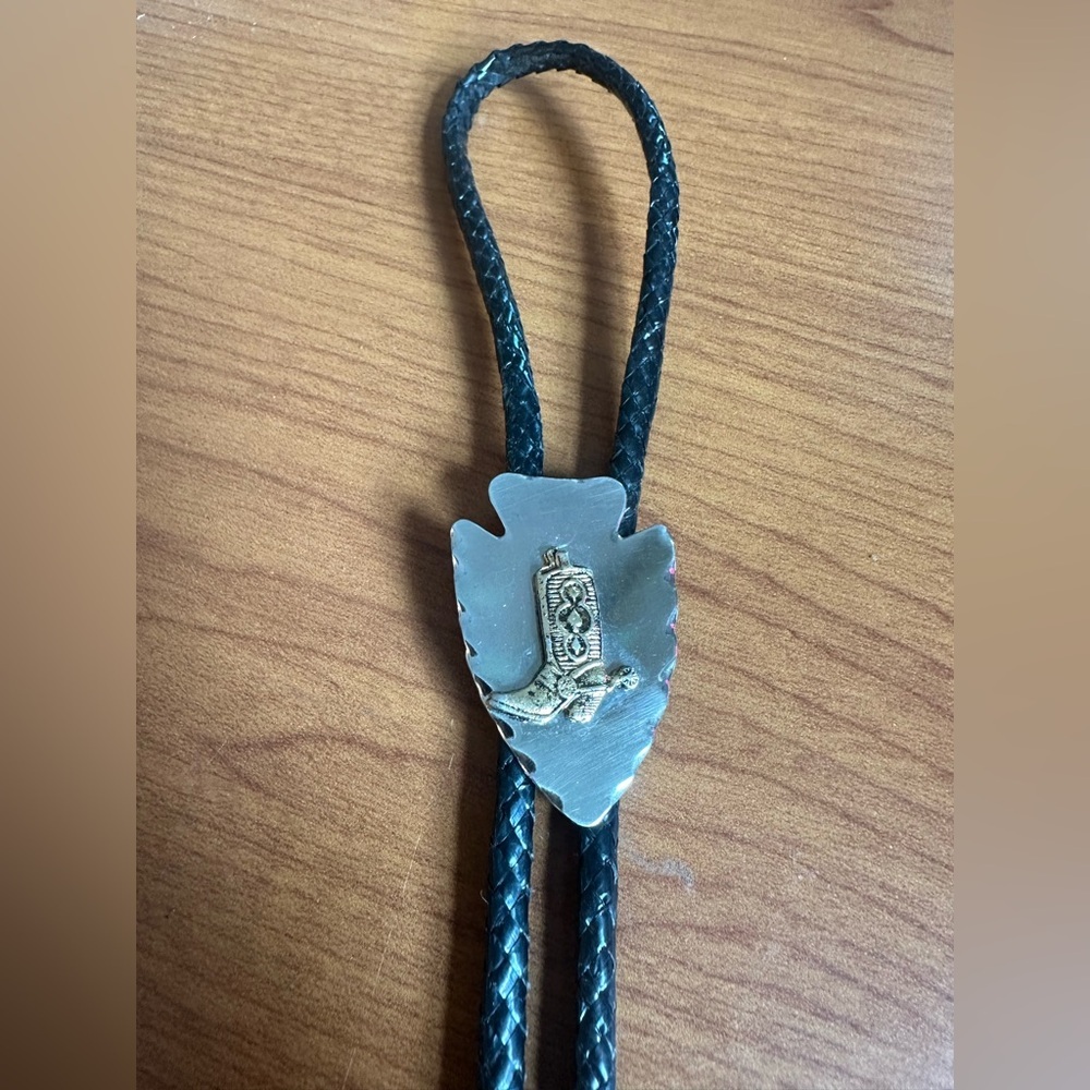 Vintage Southwestern Silvertone and Black Bolo Tie with Arrowhead & Boot Pendant